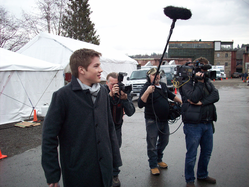 Connor Jessup and a camera crew meet us on set.