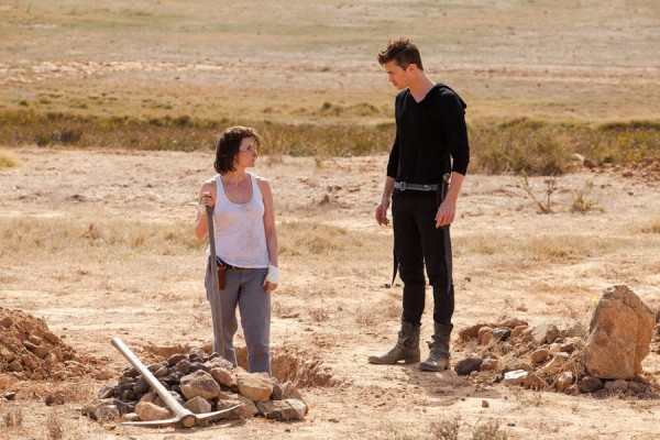 DOMINION -- "The Narrow Gate" Episode 203 -- Pictured: (l-r) Olivia Mace as Laurel, Tom Wisdom as Michael -- (Photo by: Ilze Kitshoff/Syfy)
