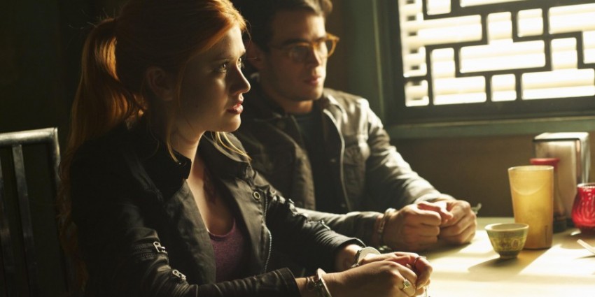 Chinese for Clary and Simone. Oh wait...what's with their hands?