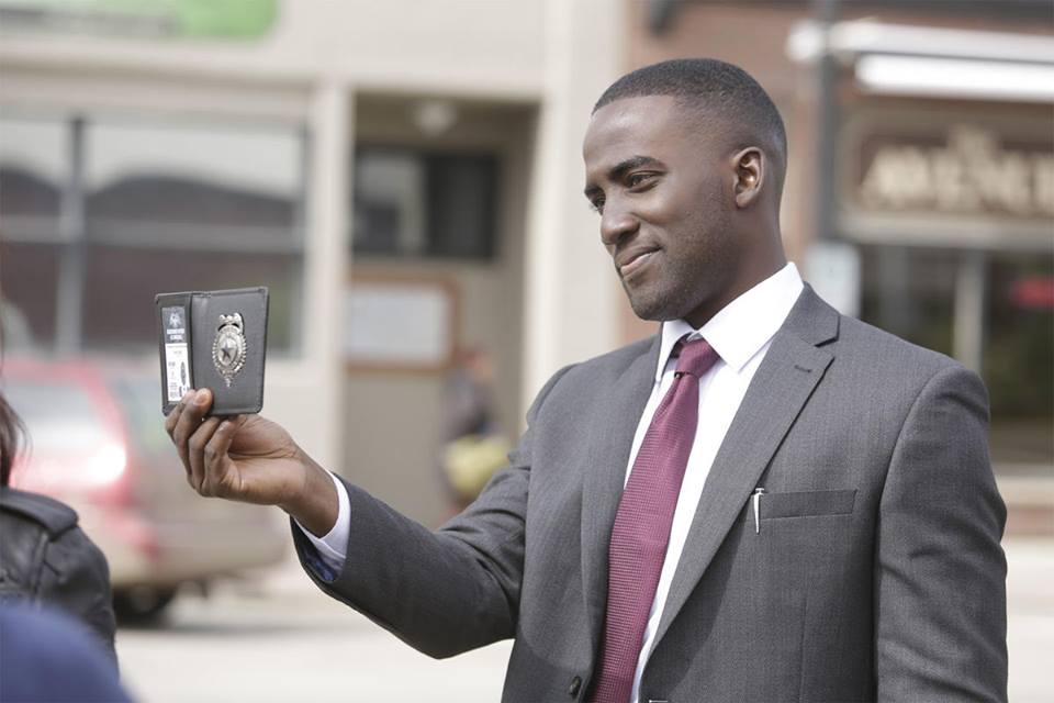 Deputy Marshall (Agent) Dolls and his "Black Badge" (Image from Syfy)