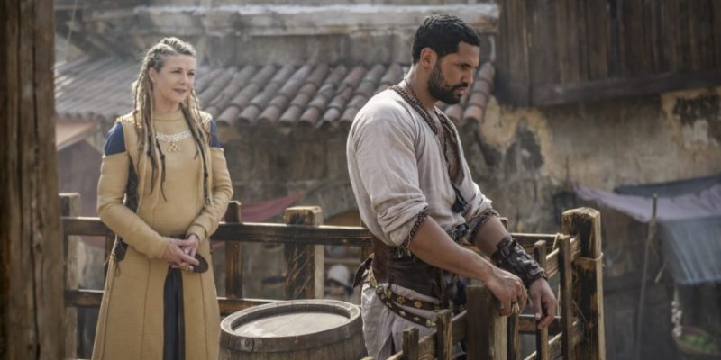 The Outpost -- "Where You Go, People Die" -- Image Number: OUT207_0004b.jpg -- Pictured (L-R): Glynis Barber as Gertrusha and Aaron Fontaine as Tobin -- Photo: Aleksander Letic/NBCU International -- © 2019 Outpost TV LLC. Courtesy of Electric Entertainment.