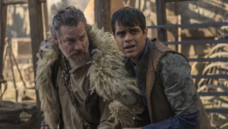 The Outpost -- "Kill the Rat, Kill the Kinj" -- Image Number: OUT306_4790.jpg -- Pictured (L-R): Adam Johnson as Munt and Anand Desai-Barochia as Janzo -- Photo: Aleksander Letic/NBCU International -- © 2020 Outpost TV LLC. Courtesy of Electric Entertainment.