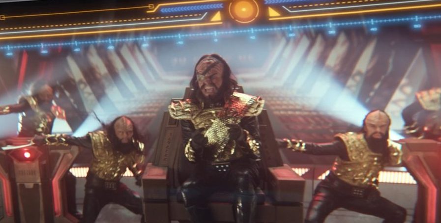 A Klingon captain (Bruce Horak) breaks into song as he crew breaks into dance during "Subspace Rhapsody." Paramount+